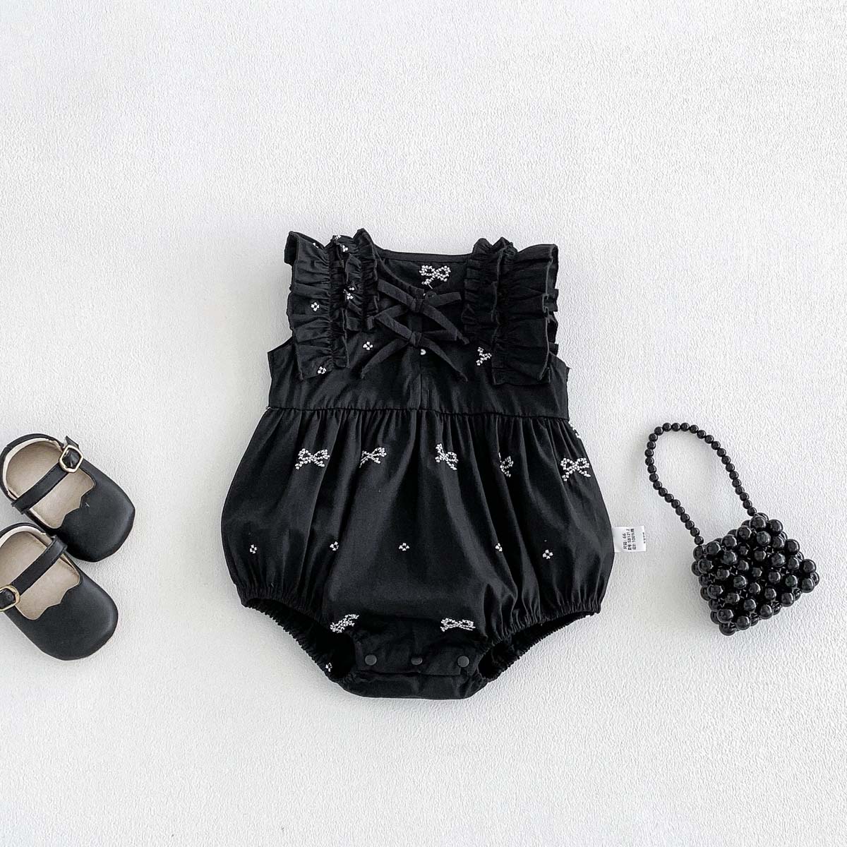 Baby Girl Black Bow Print Romp - огляд і ціна Baby Clothing Online